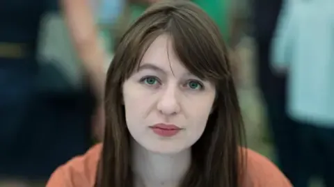 Irish author Sally Rooney states she will not visit the UK due to arrest fears